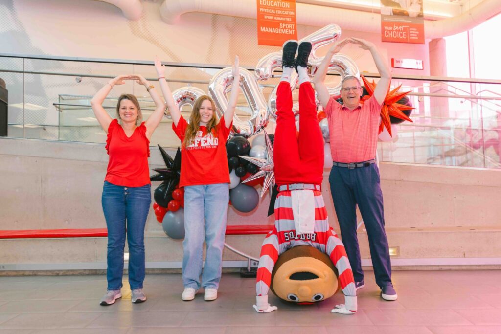 Undergraduate Open House 2025 attendees doing O-H-I-O